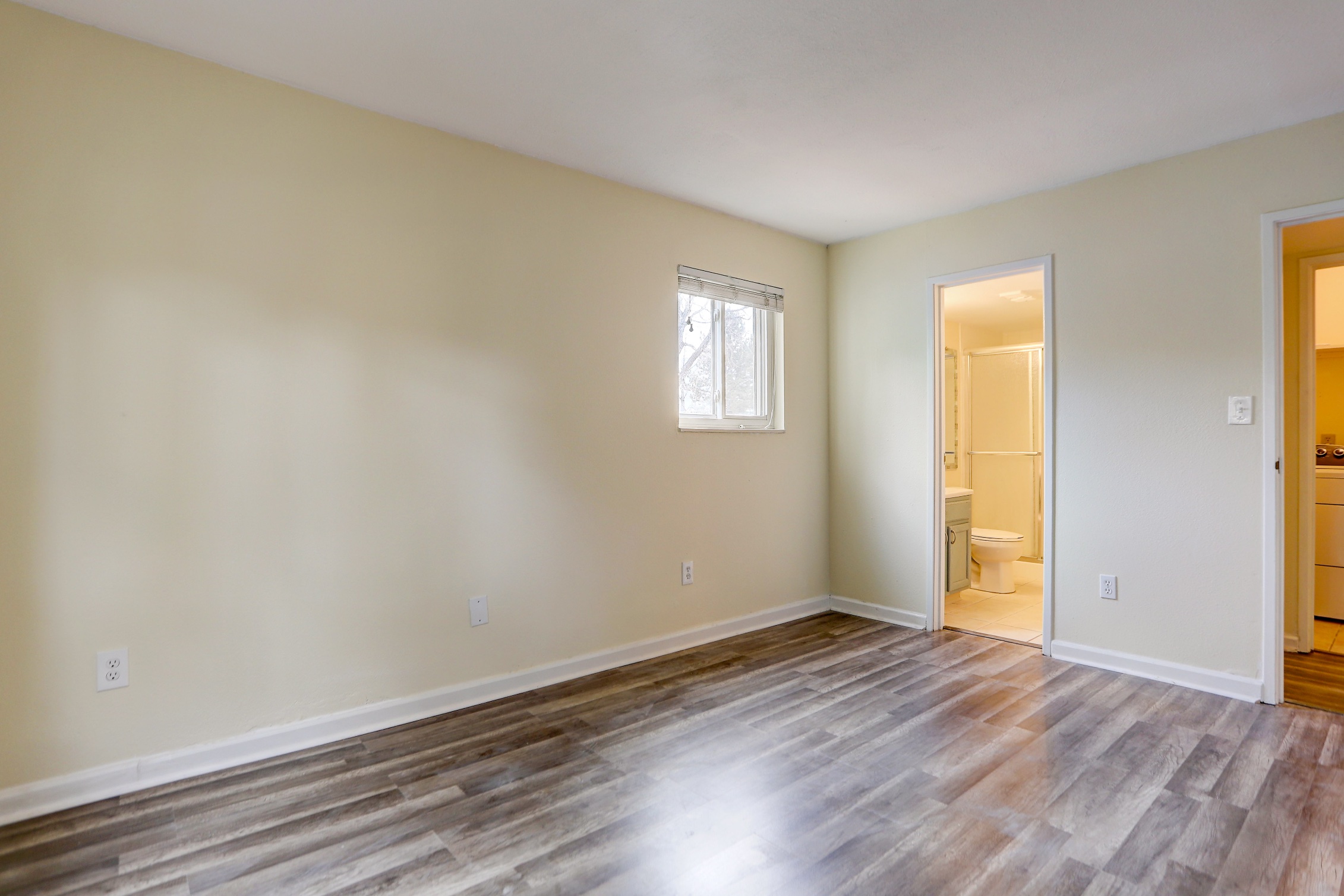 Bedroom with en-suite bathroom access, Denver apartment