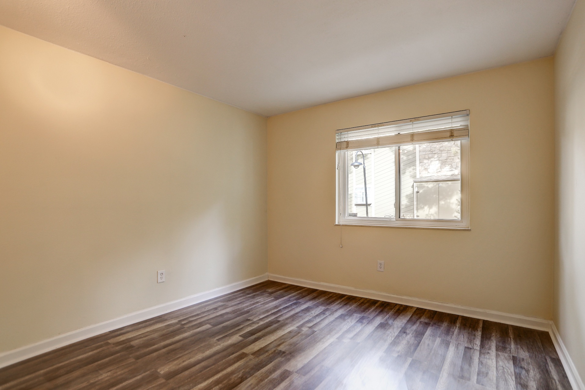 Bedroom with large window in Denver 2-bedroom apartment