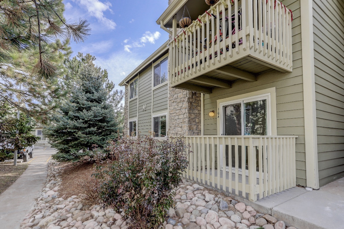 Building exterior and private patio at 4400 S Quebec St, Denver — 2-bedroom apartment for rent
